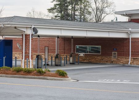 Commercial Concrete Washing in Pensacola: Removing Oil & Mold from High-Traffic Drive-Thrus
